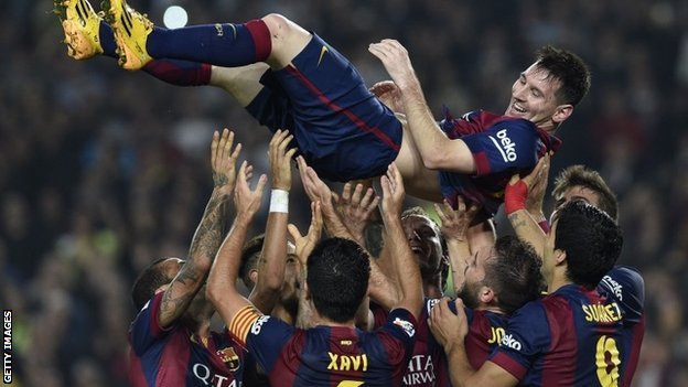 Lionel Messi is given bumps after breaking Barcelona's goalscoring record