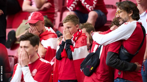 Denmark fans bin dey upset as Eriksen receive treatment on di pitch