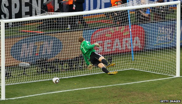 Germany goalkeeper dives as Frank Lampard shot bounces behind the line.