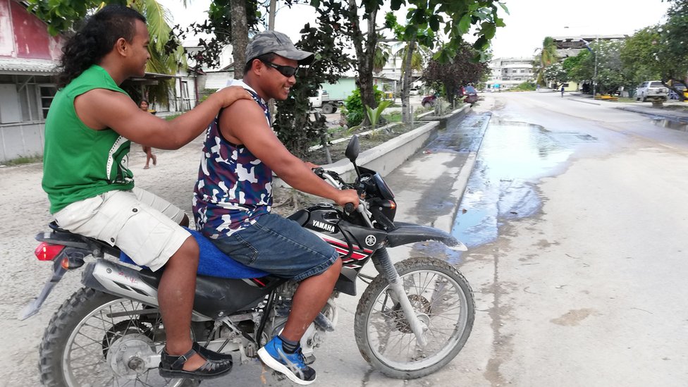 Two men dey ride okada for Nauru