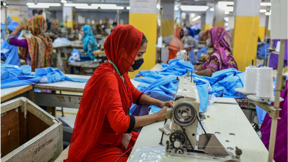 Woman working at a Bangladesh clothing factory