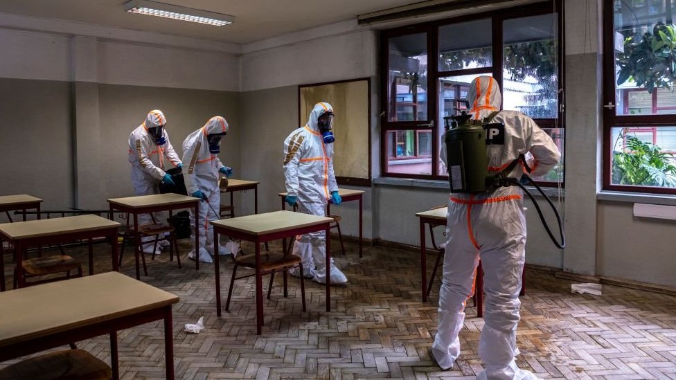 Army soldiers disinfect a classroom in Portugal