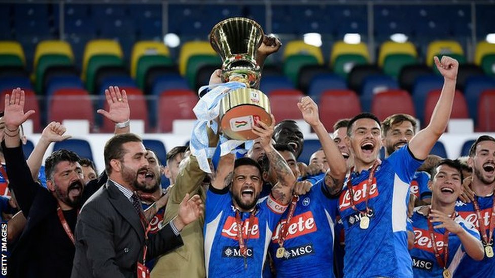 Napoli celebrate with the Coppa Italia trophy