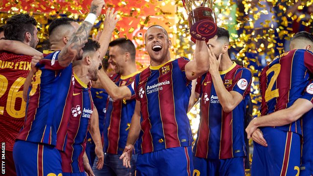 Ferrao (centre) celebrates with Barcelona