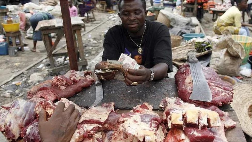 Cow meat seller dey sell market