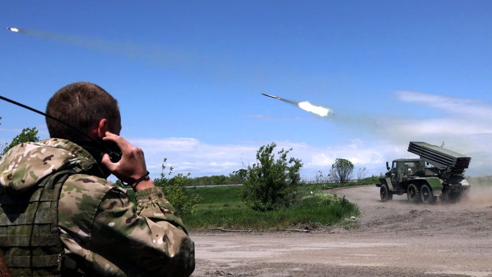 Pro-Russian forces fire a rocket targeting Ukrainian positions in Yasynuvata, Donetsk