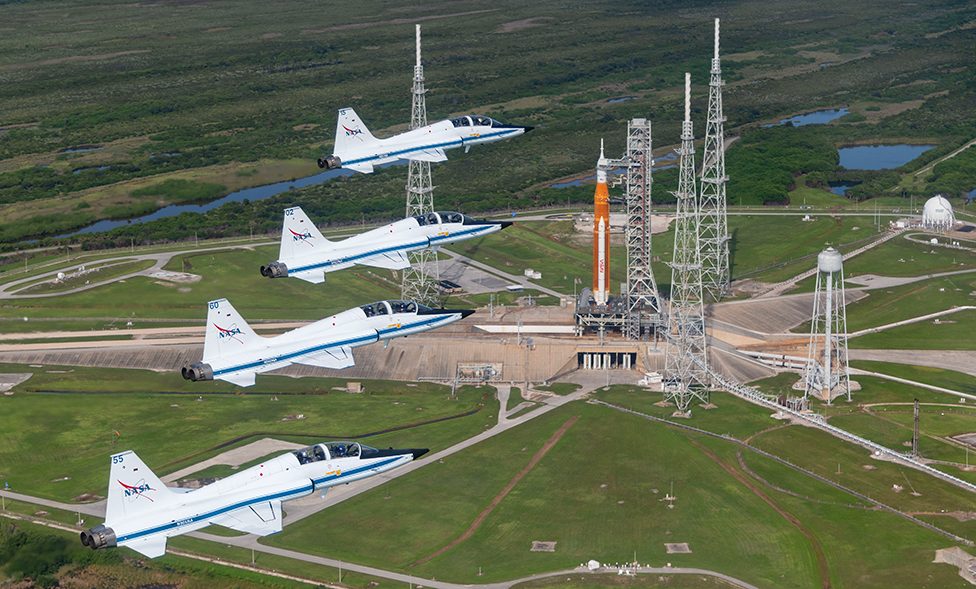Jets fly over the launch pad