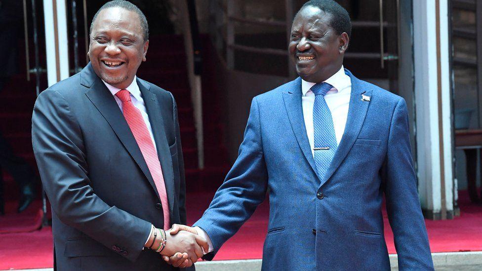 Mr Odinga and Mr Kenyatta shake hands to end a long-running political feud 