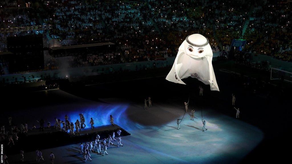 La'eeb, di tournament mascot, float above di pitch during di ceremony 