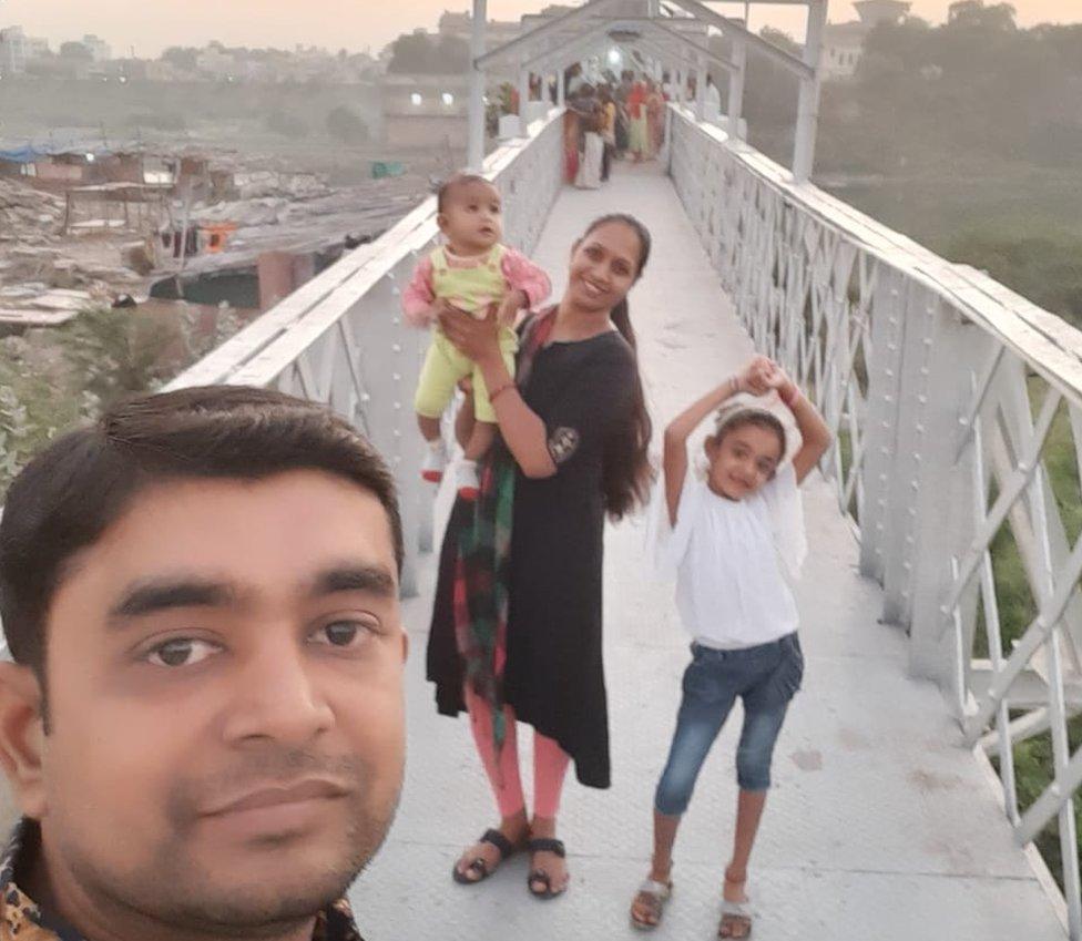 Nitin Kavaiya and family on the bridge, before im collapse