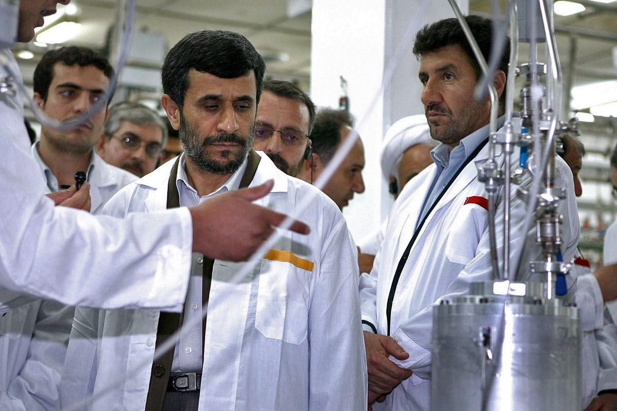 Di Iranian president for 2008, Mahmoud Ahmadinejad (centre) visit di Natanz uranium enrichment facilities for 8 April 2008 300 km south of Tehran -  Ahmadinejad announce for Iranian state television during di visit say Iran begin di installation of 6,000 new centrifuges, adding to di 3,000 centrifuges wey already dey di facility