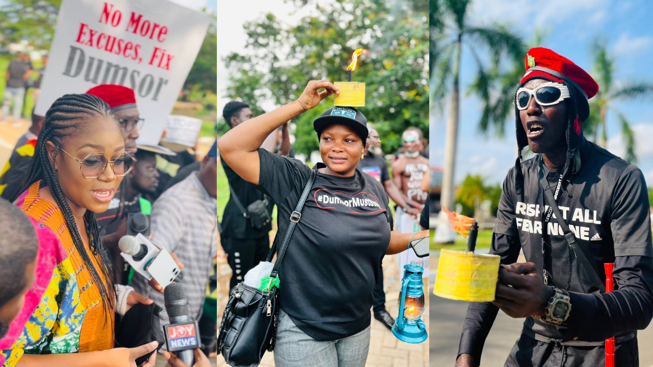 Protesters wit a placard