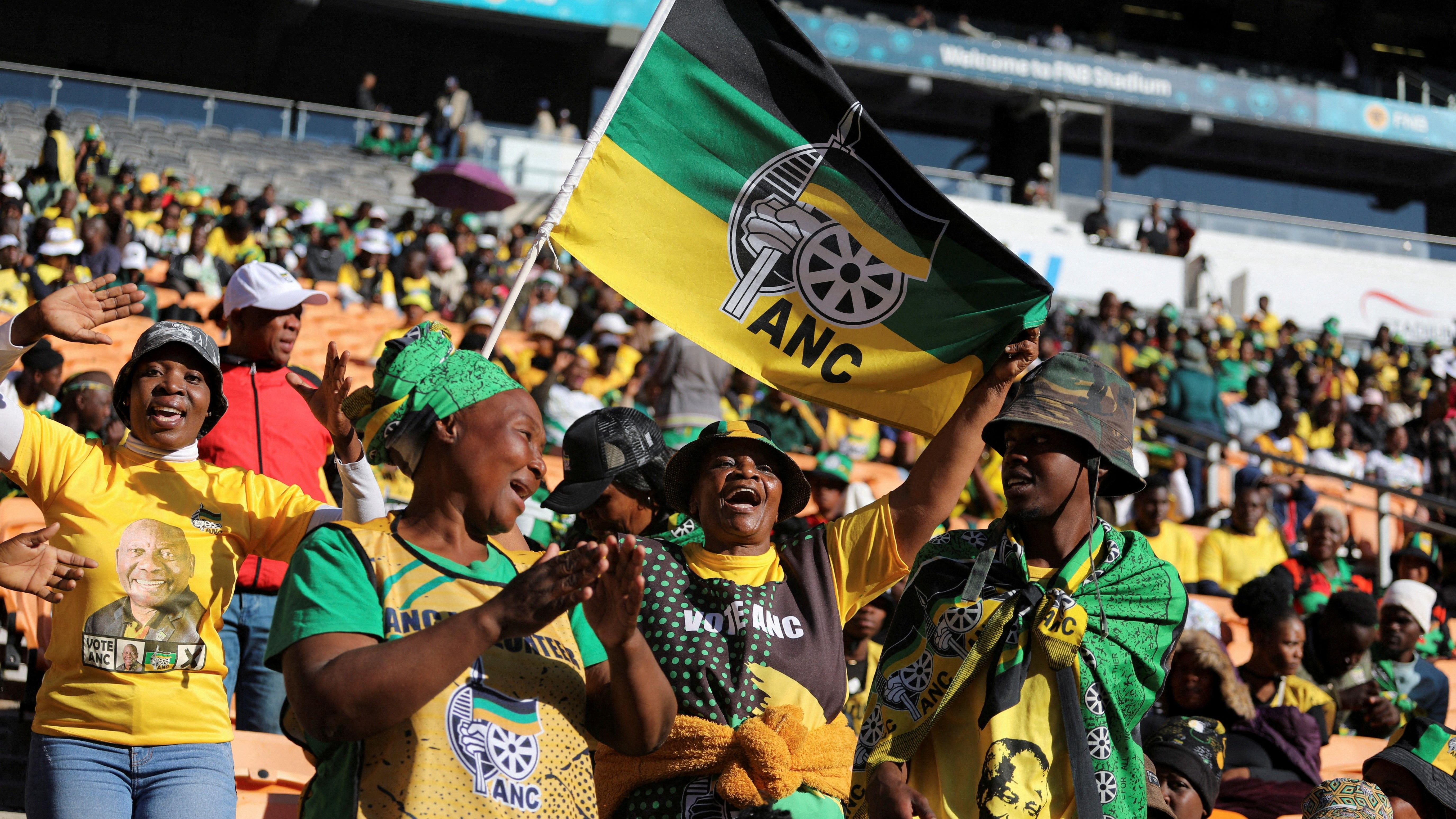 African National Congress (ANC) supporters sing songs during di political party final rally ahead of the upcoming election for FNB stadium for Johannesburg, 