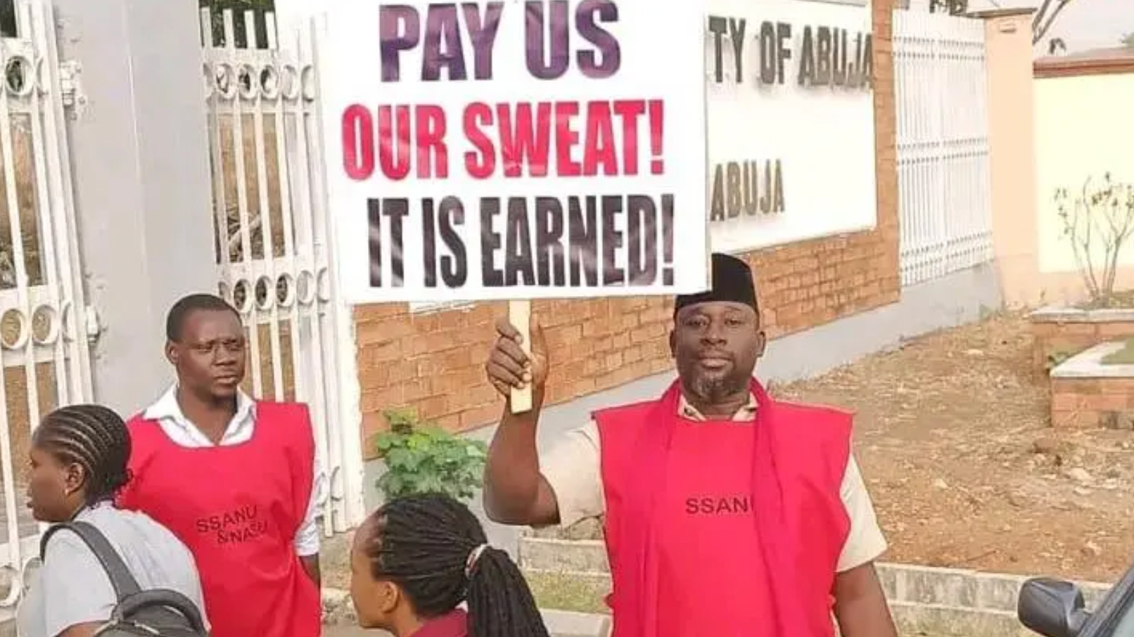 A Ssanu member display placard during dia strike in March 2024