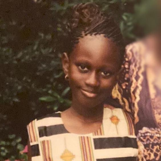 Haja with her family after a trip to Sierra Leone for 2002.