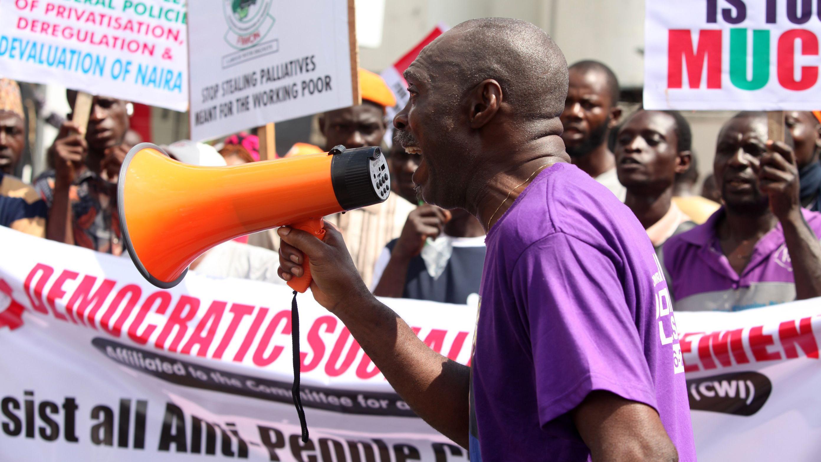 Members of civil society groups are holding a peaceful protest over economic hardship and unfriendly government policies to mark Nigeria Democracy Day in Ikeja, Lagos, Nigeria, on June 12, 2024. (Photo by Adekunle Ajayi)