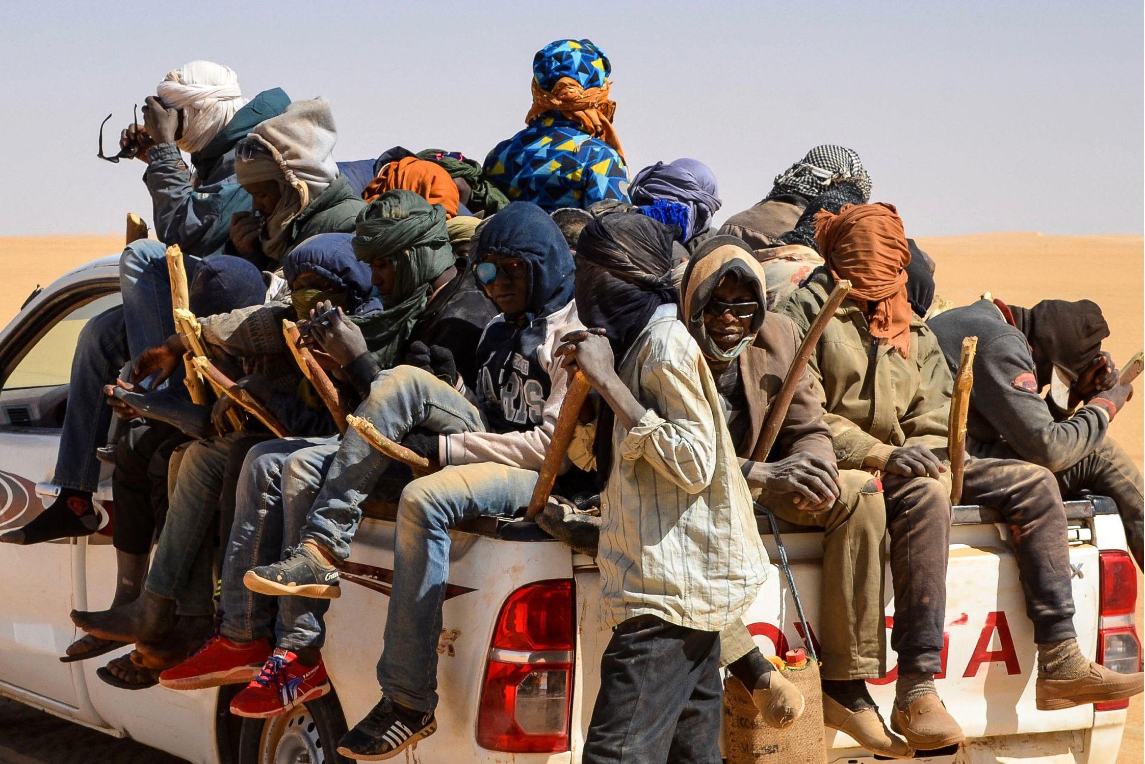 Men from Niger and Nigeria journey across the Air desert in northern Niger