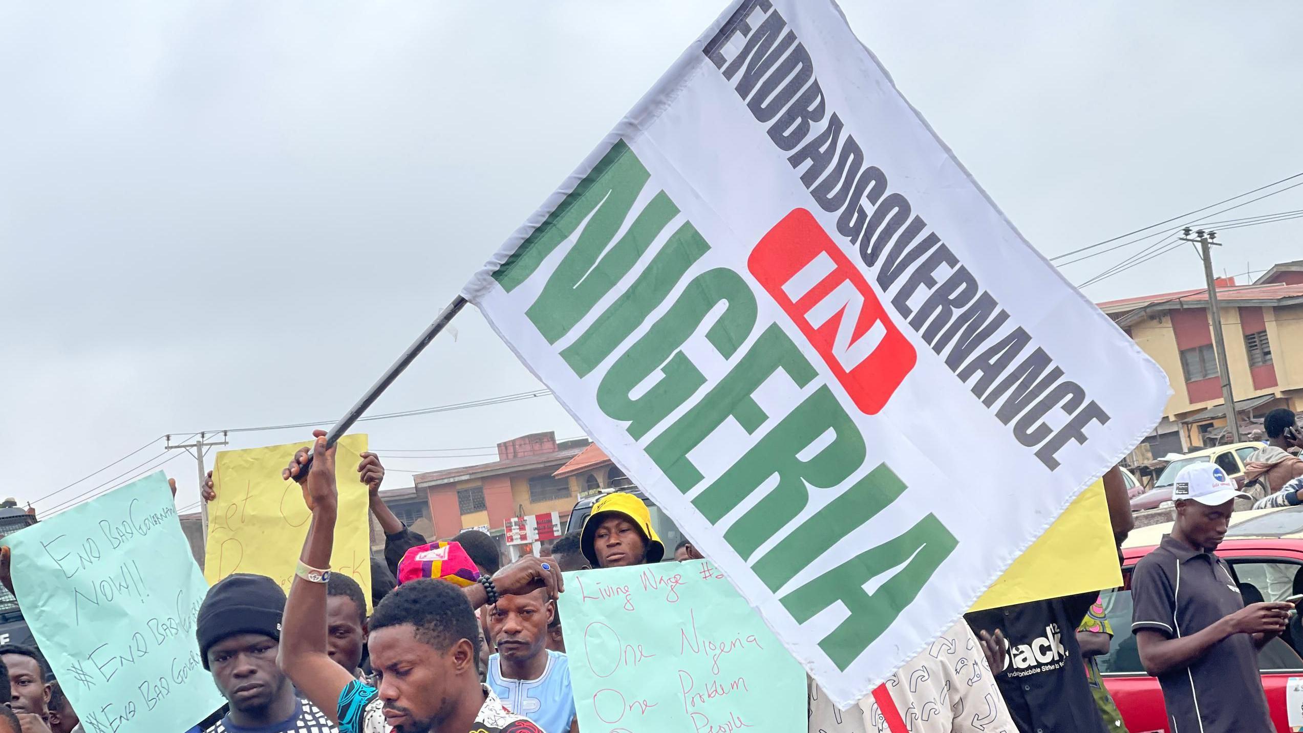 End bad governance protester wave flag during protest