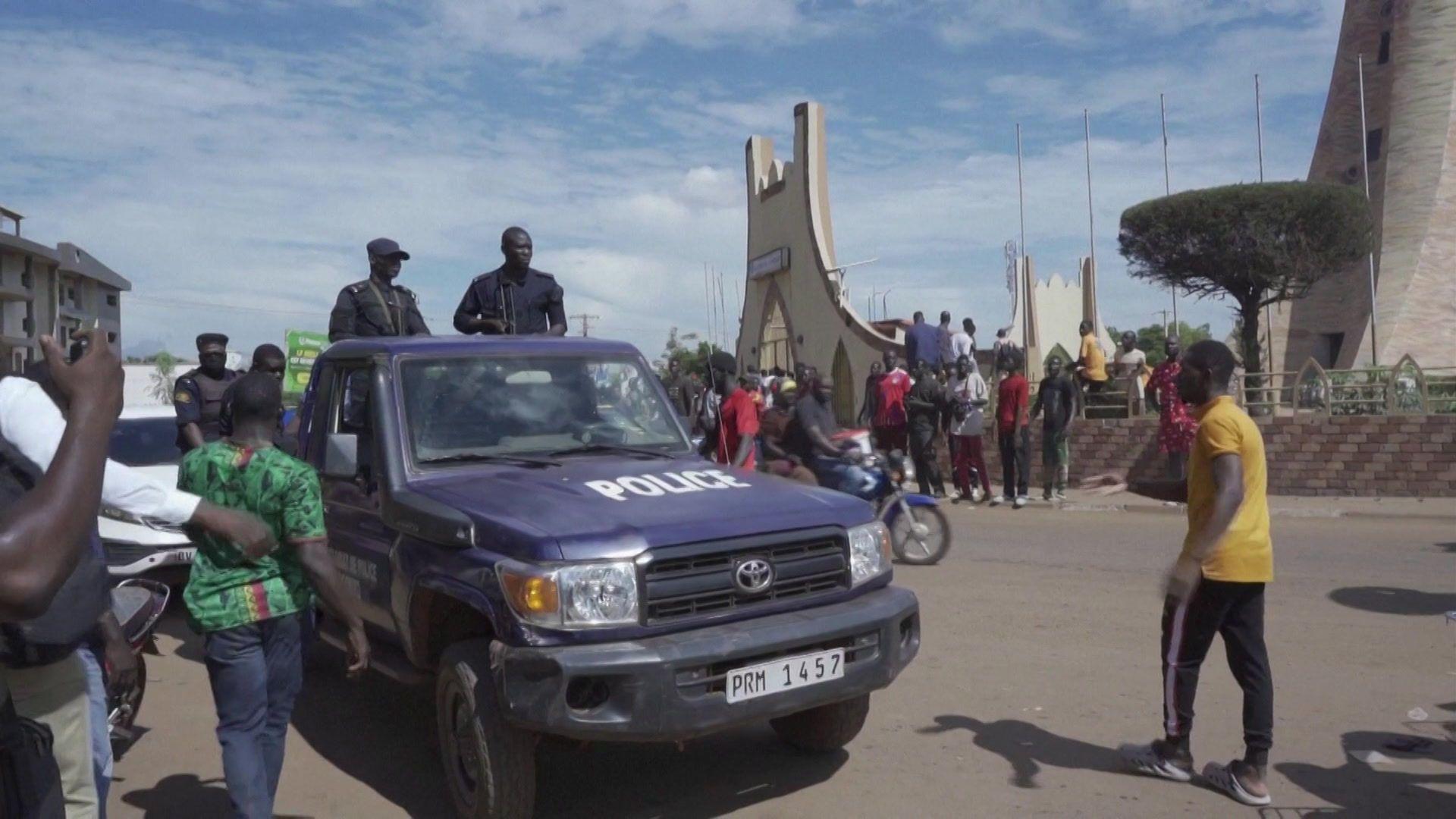 One military pick-up truck speeds through one road for Bamako, Mali capital city