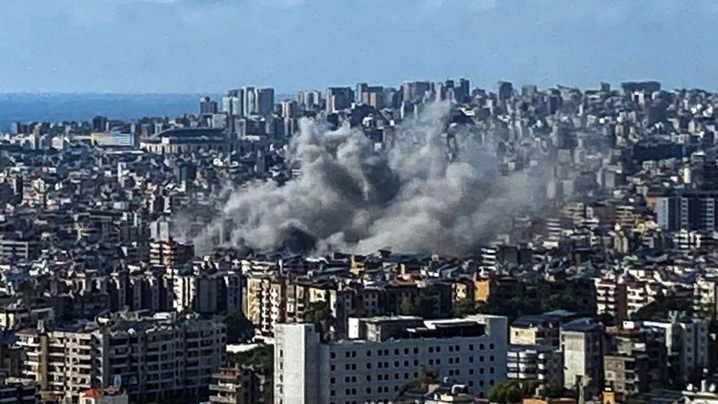 Thick smoke rises above the southern suburbs of Beirut after an Israel strike on September 20, 2024.