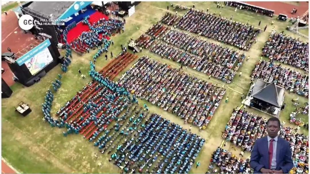 Overhead shot of a social event on di Kumasi pitch sometime in July