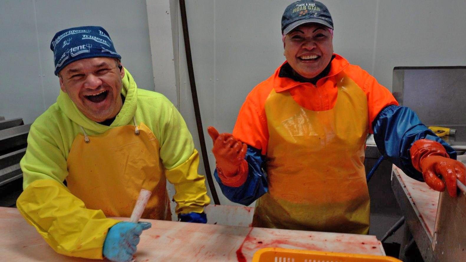 Edgar Vega Garcia and Minda dey work for di fish processing plant