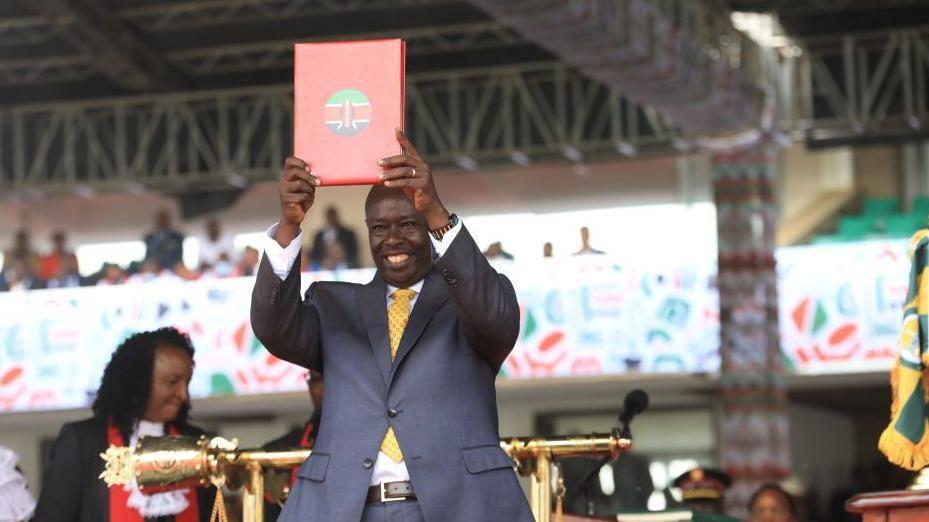 Deputy president of Kenya Rigathi Gachagua hold one certificate during di swearing in ceremony for di Kasarani Stadium