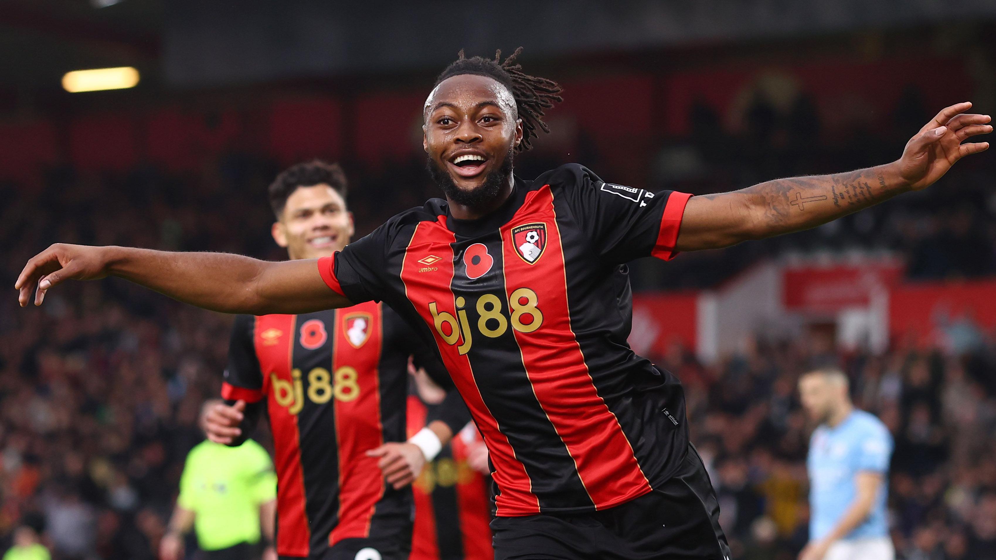 Antoine Semenyo, wear Bournemouth red and black stripe jersey celebrate afta im score goal against Manchester City